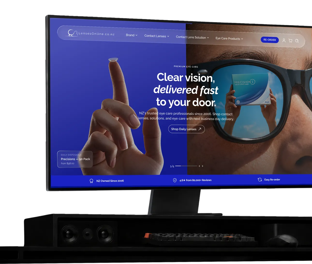 LensesOnline homepage on a desktop monitor